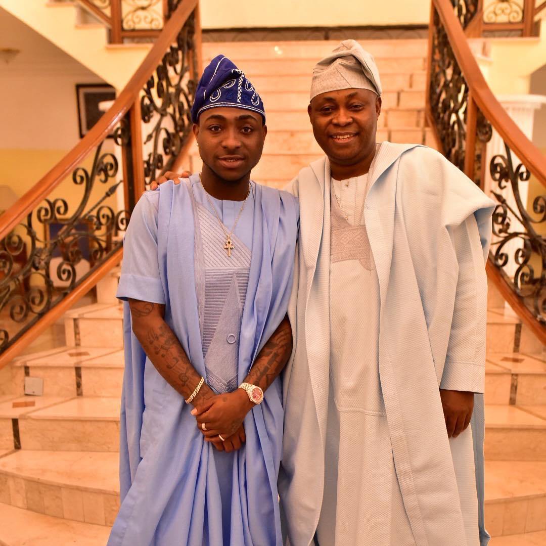 Davido and his father in traditional yoruba agbada wear