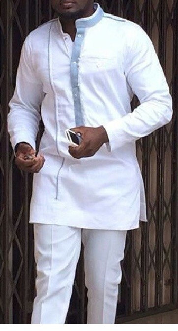 White guinea worn by black man