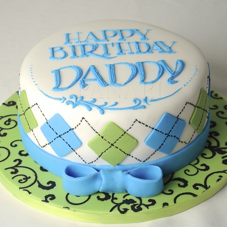 white, blue and lemon cake design for a daddy