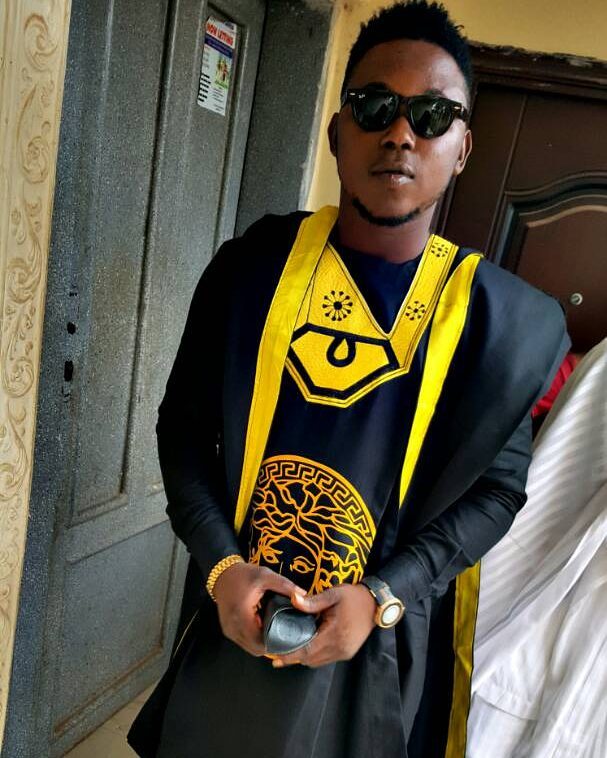 black and gold versace design agbada